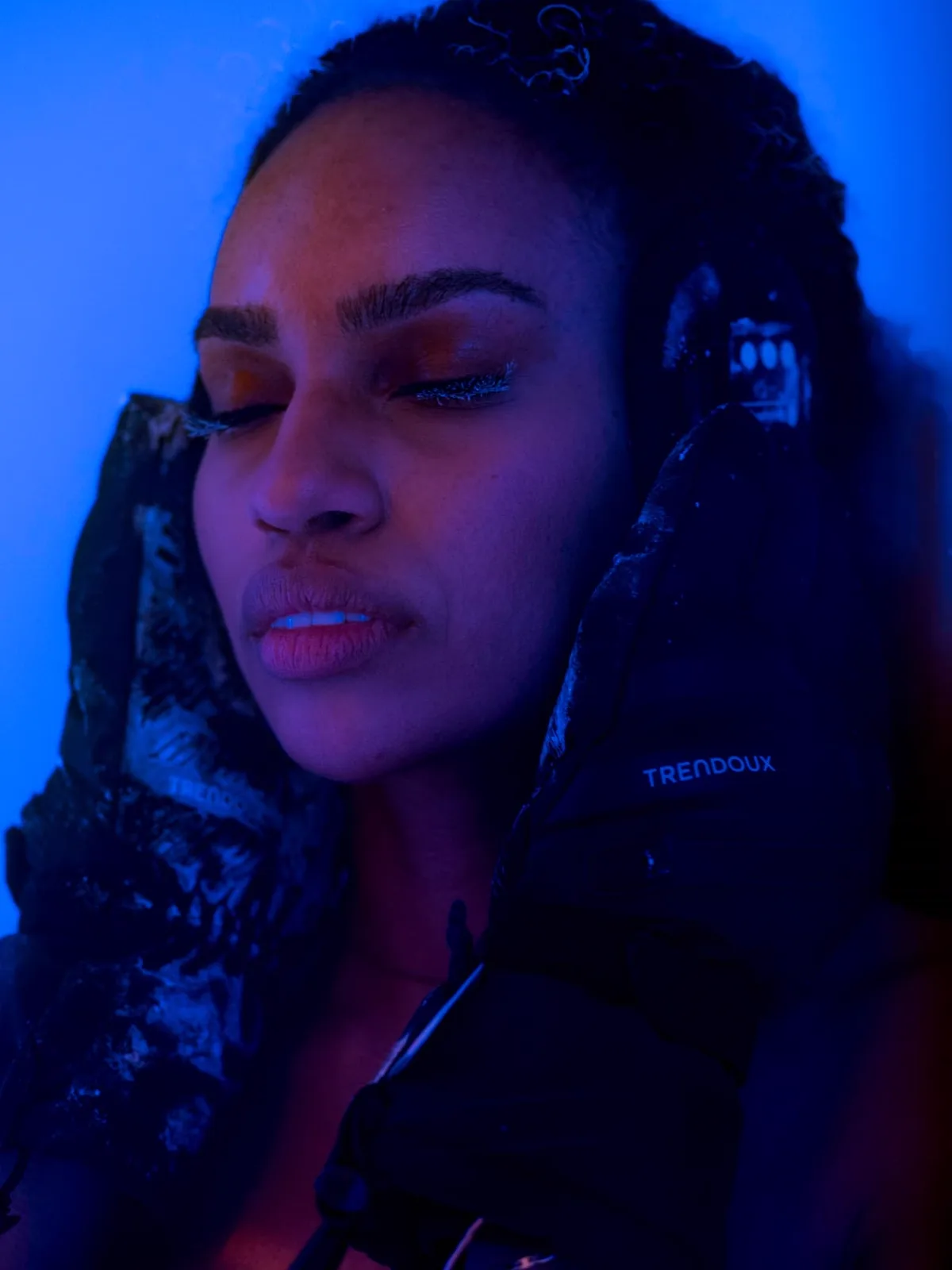 Whole Body Cryotherapy — cryotherapy chamber lit in deep blue